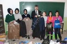 Haber: Eğitim bir-sen’den suriye’li mültecilere elbise yardimi - Öne Çıkan