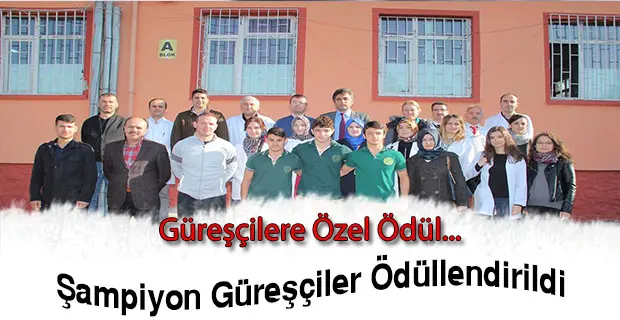 Haber: Şampiyon Güreşçilere Altın - Öne Çıkan